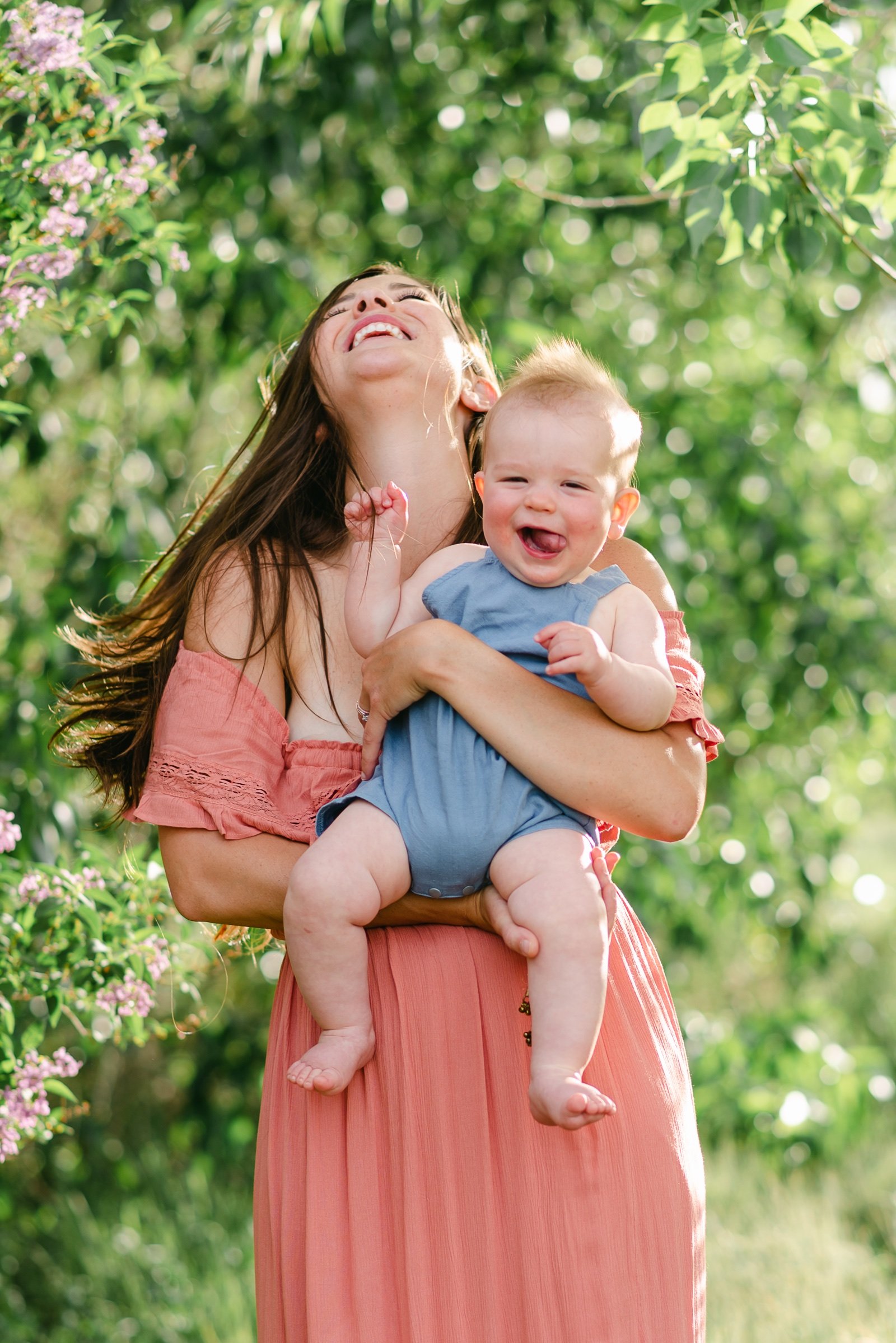 Mother and son laughing during a photoshoot near Boulder Colorado