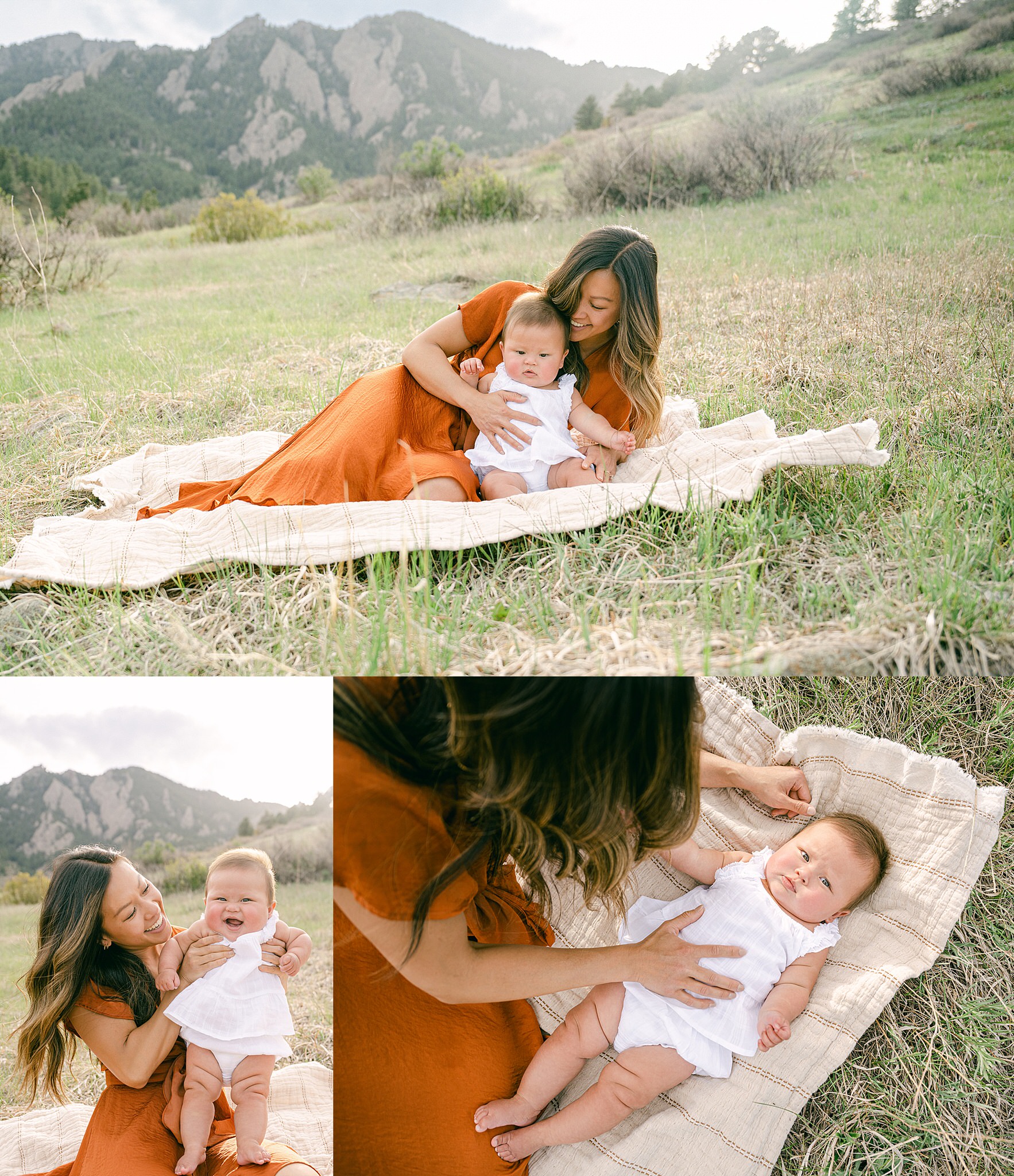 A young mother playing with a blanket with her six month baby during a photo session in Boulder, Colorado with mountains in the background.