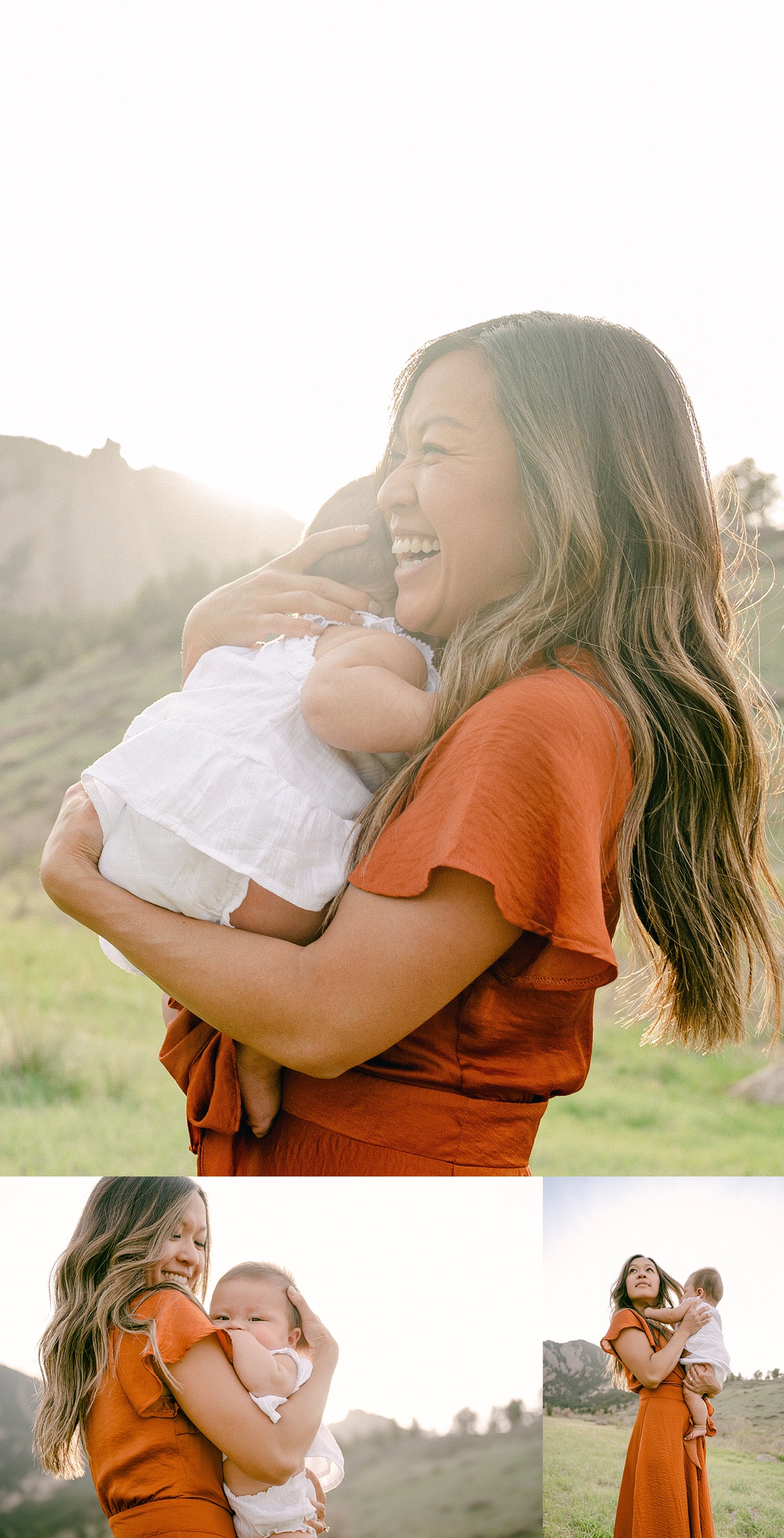 A young mother laughing while holding her six month baby during a photo session in Boulder, Colorado with mountains in the background.