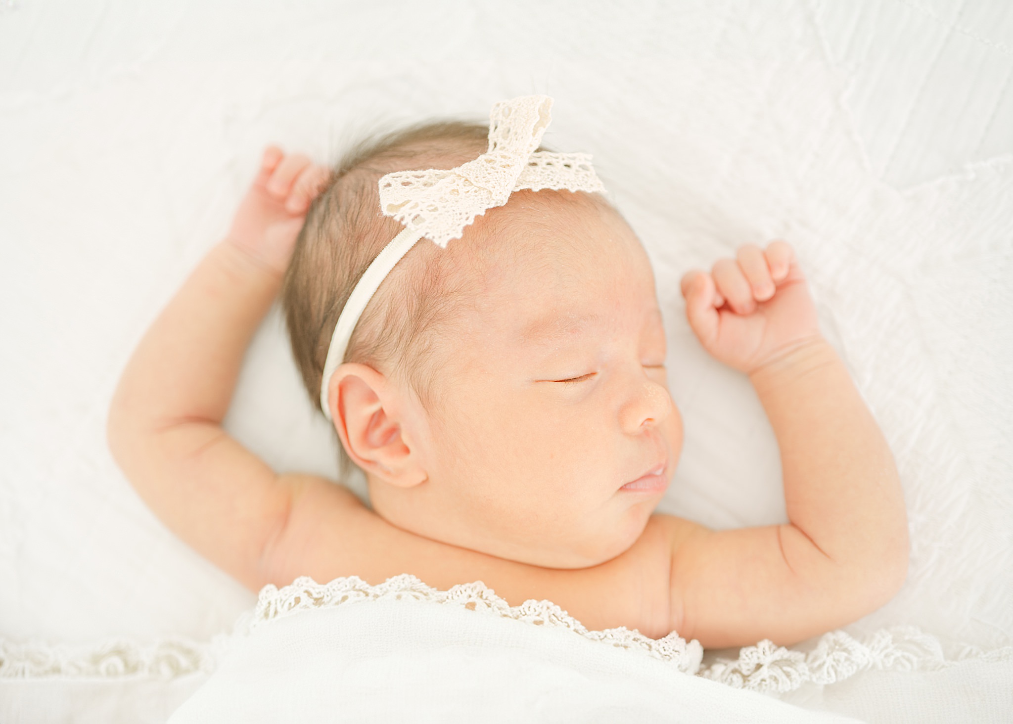 A sleeping baby during a newborn photoshoot taken by Denver Newborn Photographer Olive and Aster at Little White Photo Studio Frederick Colorado